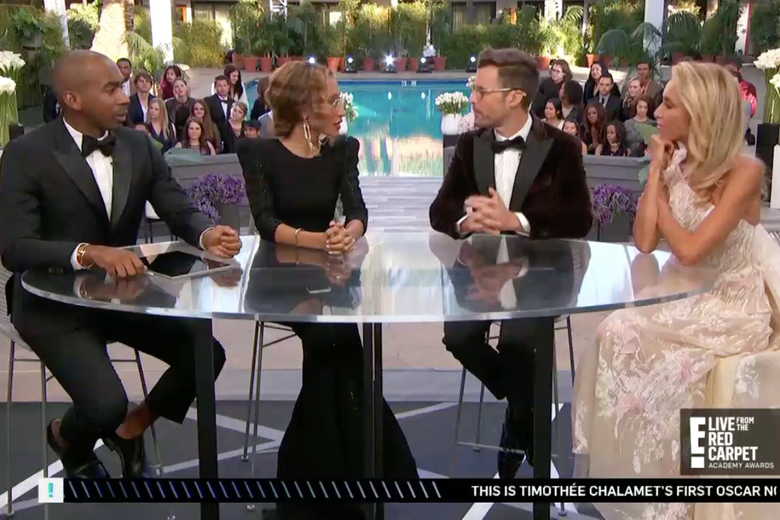 Four panelists for E! discuss the red carpet.